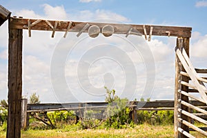 Old Western Corral Gate Detail Rustic Scene Blue Sky Background