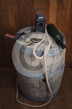 Old western revolver with cartridges and silver dollar