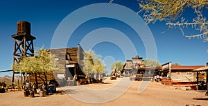 Old Western Wooden Buildings in Goldfield Gold Mine Ghost Town in Youngsberg, Arizona, USA