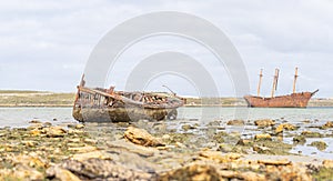An old whaler wreck in Whalebone Cove off Stanley in the Falkland Islands. photo