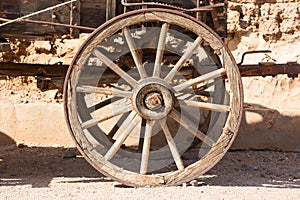 Old wheel of a covered wagon