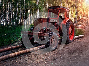 Old wheel tractor in the woods
