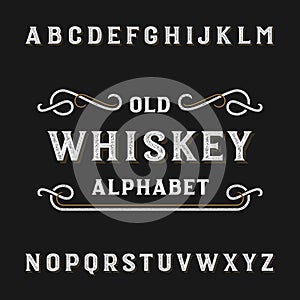 Old whiskey alphabet vector font. photo