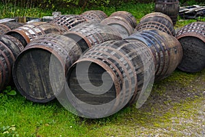 Old whisky casks near a Scotch whisky distillery