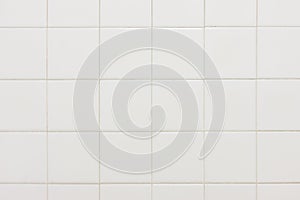 Old white bathroom tiles texture background