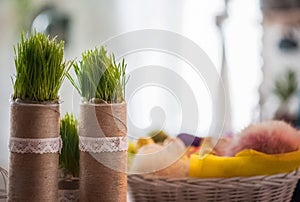Old white bicycle whist on a white stone wall.