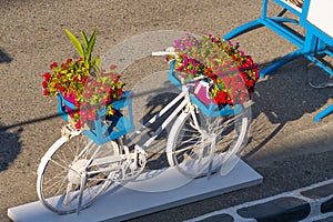 White bike decorated with flowers