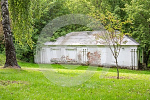 Old white brick building in the park