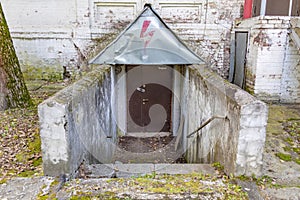 Old white brick building in the park