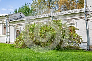 Old white brick building in the park