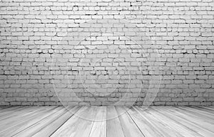Old white brick wall and wooden floor