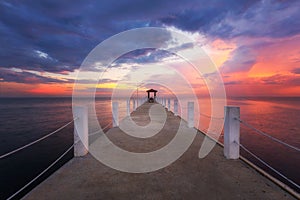 Old white bridge pier with sunset, background for travel, sea