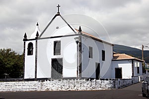 Old white chapel in the town square, Cinco Ribeiras, Terceira, Azores, Portugal photo
