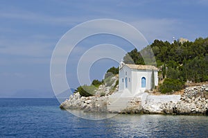 Old white church near the sea on the shore of Ithaca island