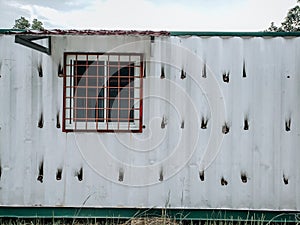 old white container left by the occupants