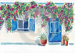 Old white Grecian house with blue window and door, with flower pots and flowers on the roof