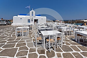 Old white house and Bay in Naoussa town, Paros island, Cyclades, Greece