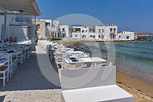 Old white house and Bay in Naoussa town, Paros island, Greece