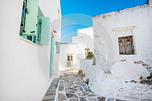 Old white houses with turquoise windows in Lefkes village photo