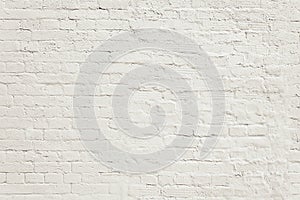 Old white painted brick wall background texture