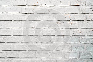 Old white painted brick wall texture background.