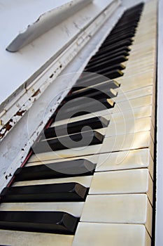 Old white piano