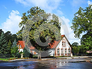 Old white rebuild home near the way , Lithuania