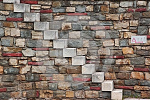 Old White Stone Stairs and multicolored Stonework Wall