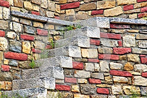 Old White Stone Stairs and multicolored Stonework Wall photo