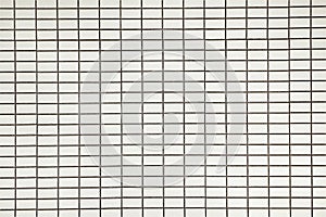 Old white tile brick wall background