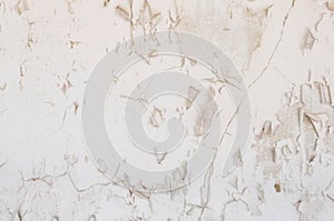 Old white wall painting cracked