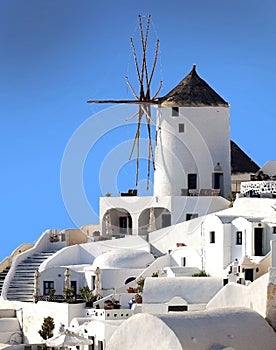 Old white windmill on Santorini i