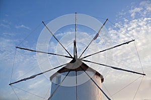 Old white windmill at sunset in Parikia on Paros Island, Cyclades, Greece