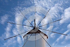 Old white windmill at sunset in Parikia on Paros Island, Cyclades, Greece