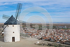 Old white windmill at a viewpoint on the hill near Consuegra Castilla La Mancha, Spain, a symbol of region