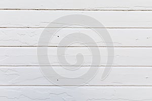 Old white wood planks on an old house wall. Newly painted. texture