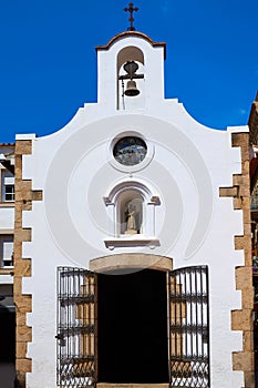 Old whitewashed church in tossa de mar