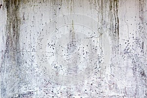 Old whitewashed weathered distressed cracked cement stone wall texture