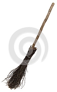 Old wicked broom on white.