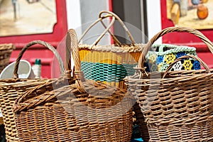 Old wicker baskets items for sale at a village flea market