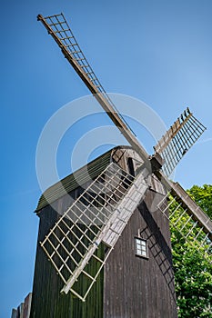 Old wind mill near Botanic Garden at Aarhus, Denmark during clear sky, vertical shot