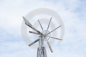 Old wind turbine wind blue sky