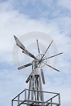 Old wind turbine wind blue sky