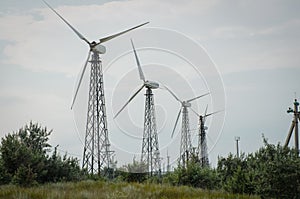 Old wind turbines in a row