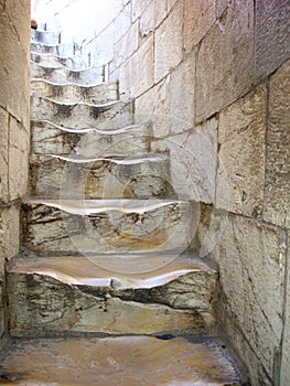 Old winding stairs in Pisa, Italy