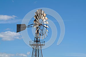 Old Windmill against blue sky