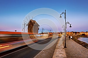 Old windmill in the ancient town of Nesebar in Bulgaria.The entrance to the old town. Bulgarian Black Sea coast. UNESCO world