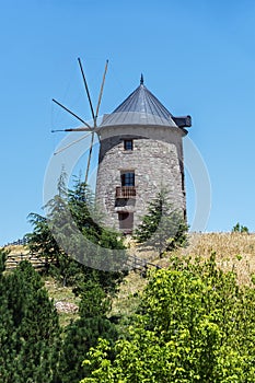 old windmill and blue sky