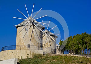Old windmill with blue sky in alacati, cesme Izmir