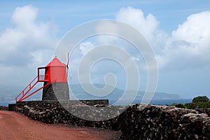 Old windmill on the island of Pico, Azores photo